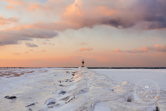 A Snowy Mattituck Inlet Jetty at Sunset